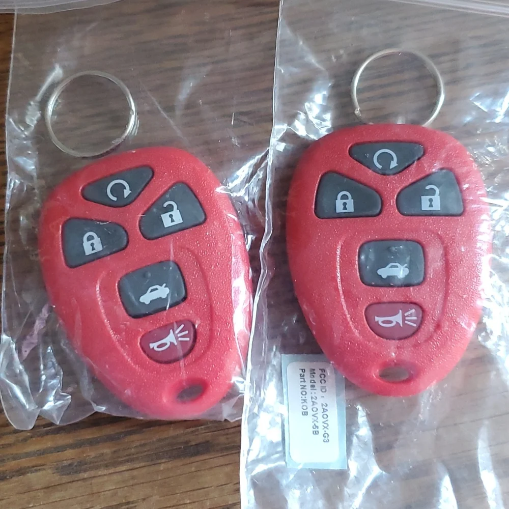 GM 2 OEM Remotes FC 5 Buttons FCC ID 2AOVX-03. Model 2AOVX5B